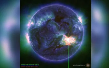 A solar flare, as seen in the bright flash in the lower right, captured by NASA’s Solar Dynamics Observatory on May 9, 2024. (NASA/SDO via AP)