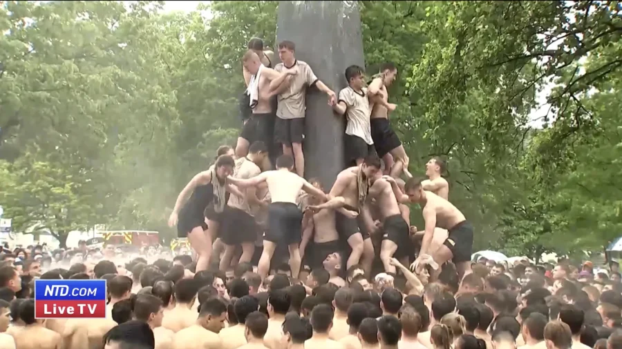 US Naval Academy Midshipmen Attempt Annual Greased Climb