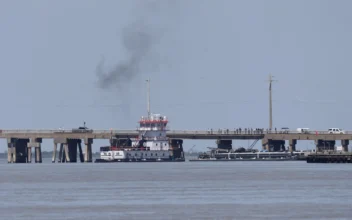 Investigation, Cleanup Underway After Fuel Barge Strikes Galveston Bridge
