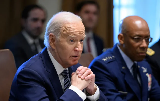 U.S. President Joe Biden and Chairman of the Joint Chiefs of Staff General Charles Q. Brown Jr. attend a meeting in the Cabinet Room of the White House in Washington on May 15, 2024. (Mandel Ngan/AFP via Getty Images)
