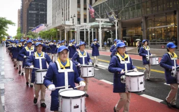 Members of Tianguo Marching Band Express Joy at World Falun Dafa Day Parade