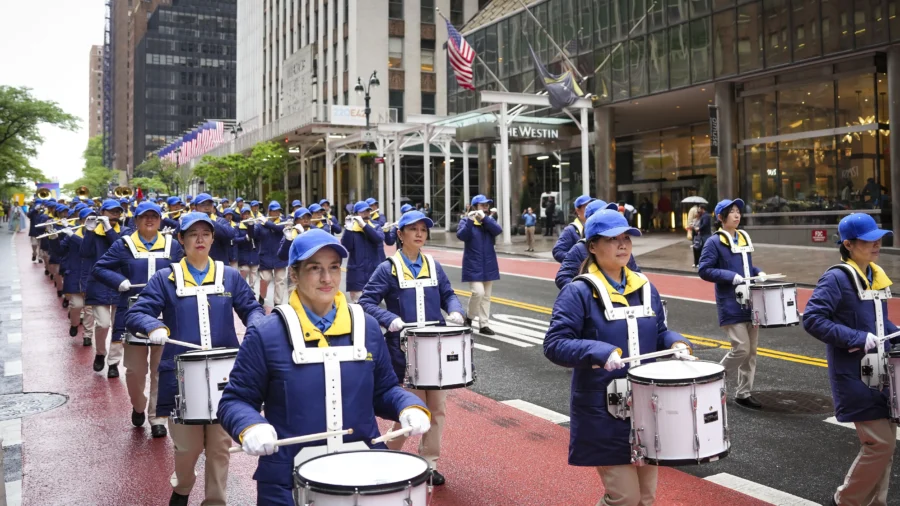 Members of Tianguo Marching Band Express Joy at World Falun Dafa Day Parade