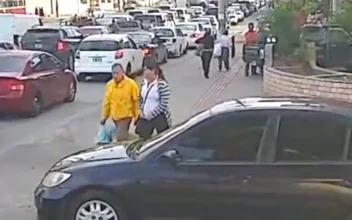 Pedestrians Walk on Car Blocking Crosswalk