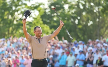 Xander Schauffele of the United States celebrates after winning on the 18th green during the final round of the 2024 PGA Championship at Valhalla Golf Club in Louisville, Ky., on May 19, 2024. (Michael Reaves/Getty Images)