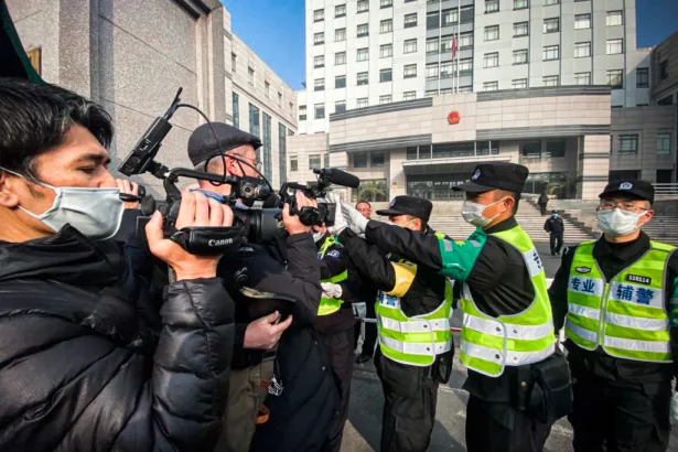 Police attempt to stop journalists