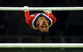 Gymnast Gubby Douglas Ends Olympic Bid Due to Injury