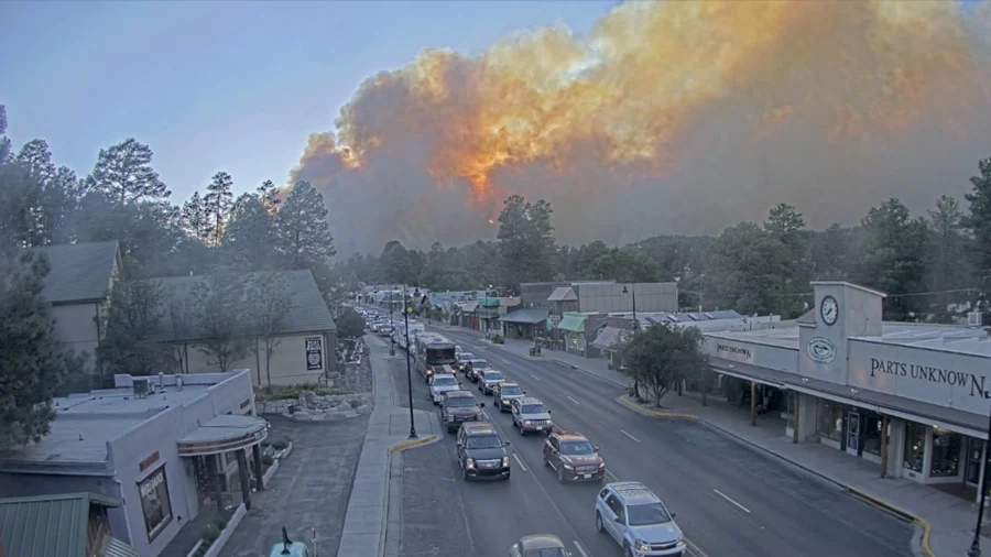 New Mexico Wildfire Claims Second Life, While Rain Offers Hope of Relief