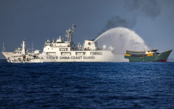 Philippines Vessels Take Hits From China Water Cannons