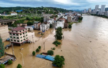 98 Chinese Rivers Surge Above Flood Warning Level