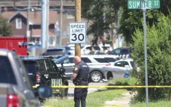 Armed Bicyclist Killed in Iowa Shooting That Wounded 2 Police Officers, Investigators Say