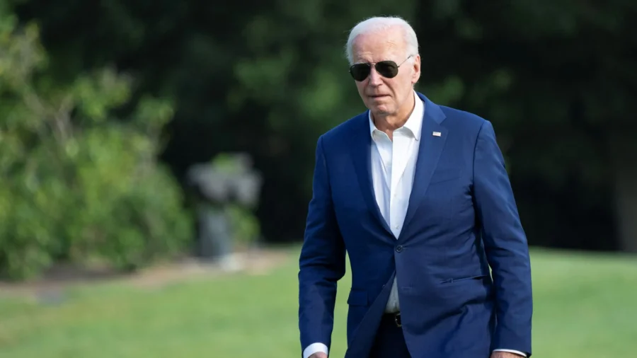 Biden Tells Congressional Democrats He Is Firmly Committed to Staying in Race