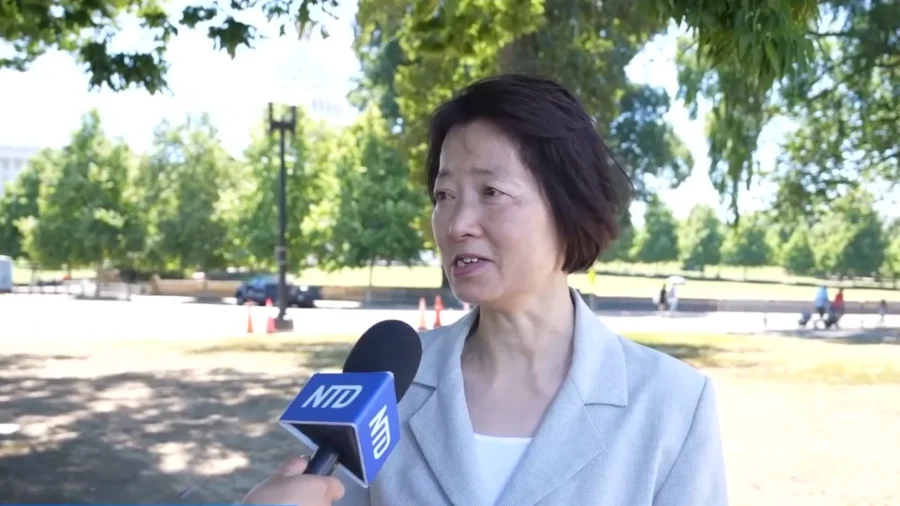 Falun Gong Practitioner Recounts Loss of Husband, Forced Exile due to CCP Persecution