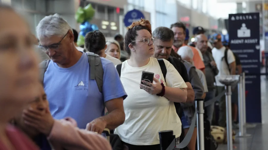 Delta Air Lines Says Cancellations Continue as It Tries to Restore Operations After Tech Outage