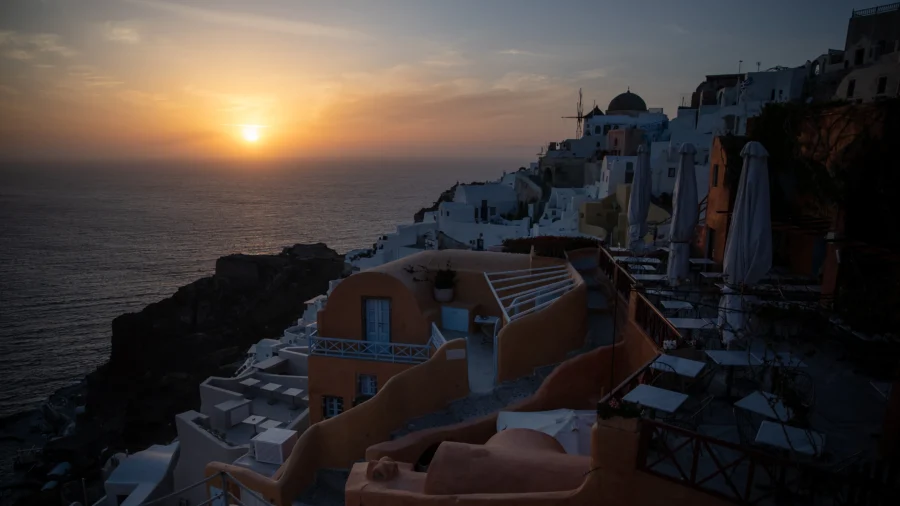 Greece Tourism: Tourists Watch the Iconic Sunset of Santorini