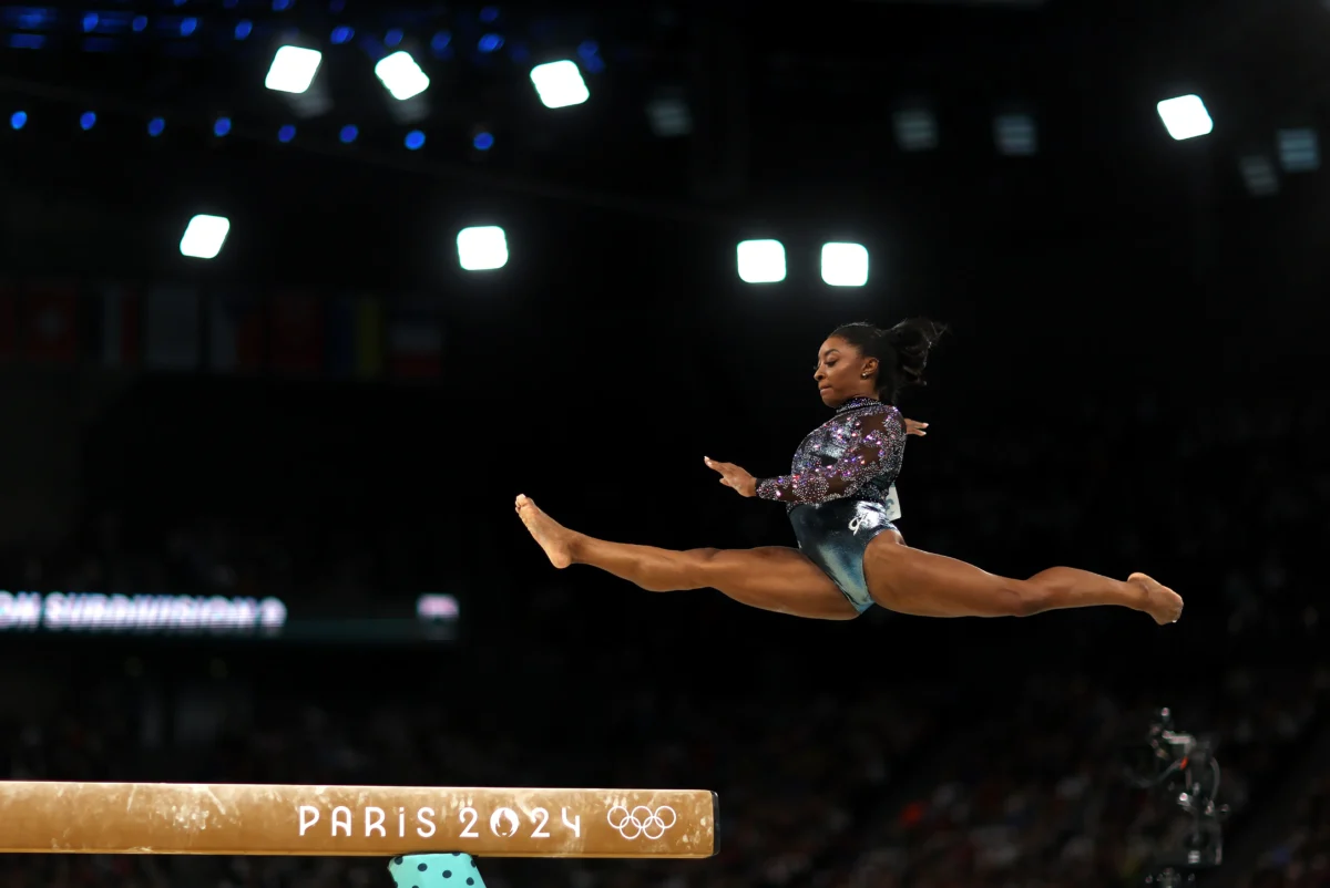 Simone Biles of Team USA competes on the balance beam during the Artistic Gymnastics Women's Qualification on day two of the Olympic Games in Paris, on July 28, 2024. (Photo by Naomi Baker/Getty Images)