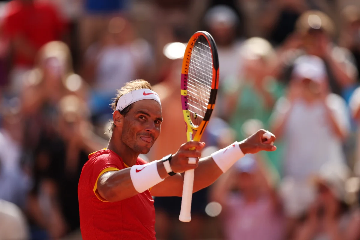 Rafael Nadal of Team Spain celebrates after winning match point against Marton Fucsovics of Team Hungary during the Men’s Singles first round match on day two of the Olympic Games at Roland Garros in France, on July 28, 2024 in Paris. (Clive Brunskill/Getty Images)