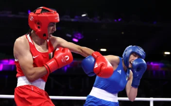 Algerian Boxer Who Previously Failed Gender Eligibility Criteria Wins Olympic Match After Opponent Quits