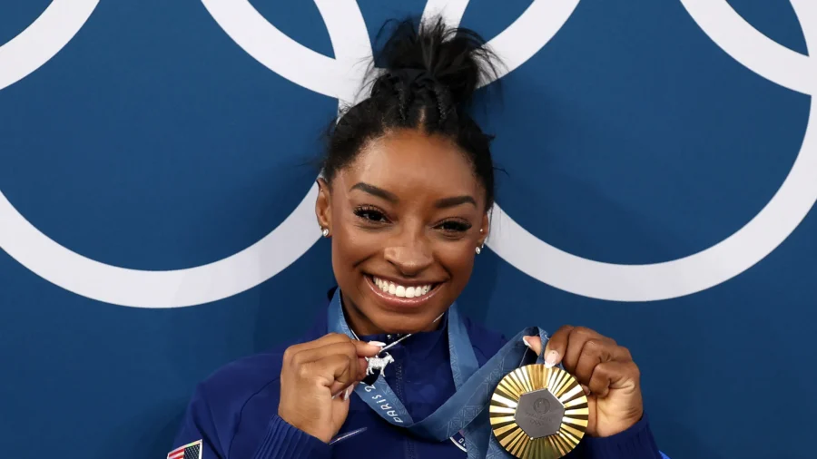 Simone Biles Strikes Gold Again in Women's All-Around Gymnastics