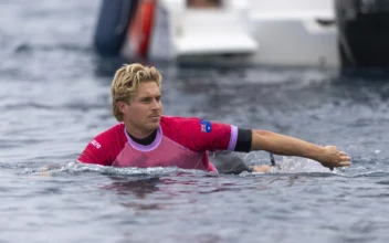 Judge Removed From Olympics Surfing Panel After Photo With Athlete Circulates on Social Media