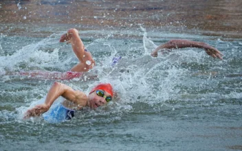 Olympic Triathlon Mixed Relay Goes Ahead With Swims in Seine Amid Water Quality Concerns