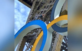 Police Arrest Man Climbing Eiffel Tower, Prompting Evacuation Hours Before Closing Ceremony