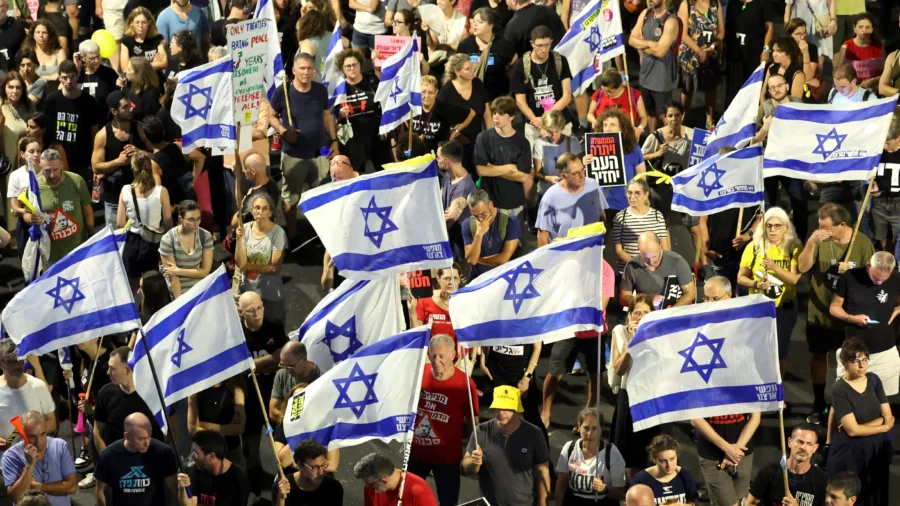 Families of Israeli Hostages March in Tel Aviv on Day of Israel-Gaza Cease-Fire Talks