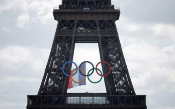 Debate Over Keeping Olympic Rings on Eiffel Tower