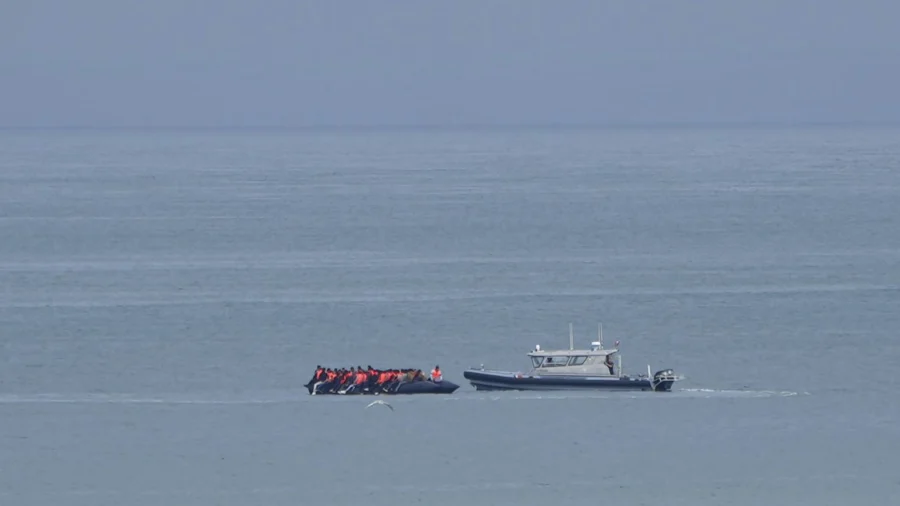 UK Rejects Asylum Treaty Proposal Amid Calls From France