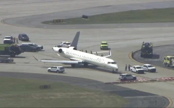 Delta Flight Bound for Tokyo Clips Smaller Plane on Atlanta Runway