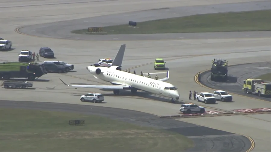 Delta Flight Bound for Tokyo Clips Smaller Plane on Atlanta Runway