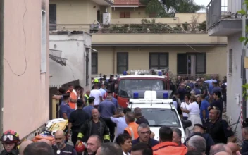 Building Collapse in Italy Kills 2 Young Siblings and Their Mother