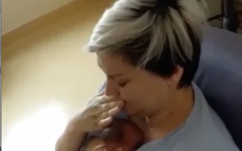 Mother Holds Newborn for the First Time