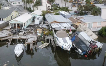 Supplies Rushed to Communities Isolated by Helene as Death Toll Rises to Nearly 100