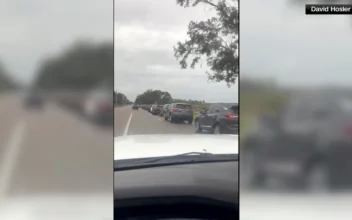 Cars Line Up for Sandbags in St. Petersburg, Florida, as Hurricane Milton Looms