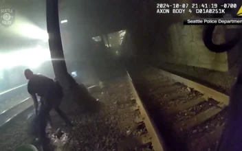 Officers Pull Injured Man from Tracks Just Moments Before Speeding Train Arrives