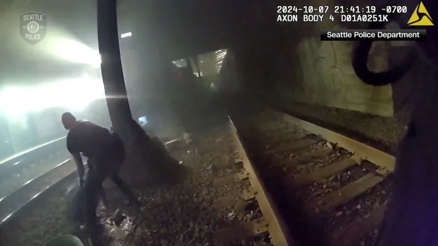 Officers Pull Injured Man from Tracks Just Moments Before Speeding ...