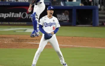 Los Angeles Dodgers starting pitcher Yoshinobu Yamamoto (18) reacts after striking out New York Yankees' Anthony Rizzo during the fourth inning in Game 2 of the baseball World Series in Los Angeles on Oct. 26, 2024. (Julio Cortez/AP Photo)