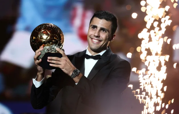 Manchester City's Spanish midfielder Rodri receives the Ballon d'Or award during the 2024 Ballon d'Or France Football award ceremony at the Theatre du Chatelet in Paris on Oct. 28, 2024. (Franck Fife/AFP via Getty Images)