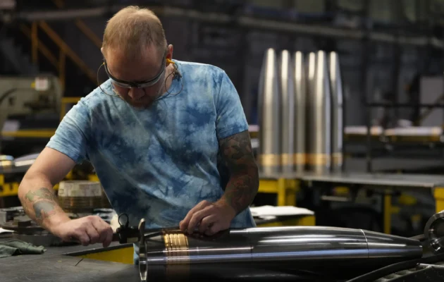 A steel worker inspects a 155 mm M795 artillery projectile at the Scranton Army Ammunition Plant, in Scranton, Pa., on Aug. 27, 2024. (Matt Slocum/AP Photo)