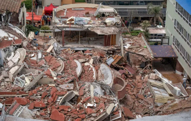 Rescuers search for missing people after the collapse of the Dubrovnik Hotel in the seaside resort of Villa Gessell, Buenos Aires province, on October 29, 2024. An elderly man was killed and a dozen people are missing after a ten-storey building housing a hotel collapsed Tuesday in the Argentine seaside resort of Villa Gesell, local authorities and media reported. (Photo by STRINGER / AFP) (Photo by STRINGER/AFP via Getty Images)