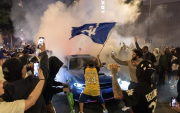 Los Angeles Sees Bus Burned, Store Thefts, and Rowdy Crowds After Dodgers Win World Series