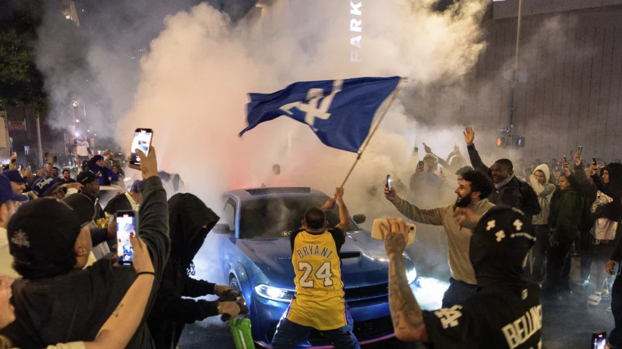 Los Angeles Sees Bus Burned, Store Thefts, and Rowdy Crowds After Dodgers Win World Series