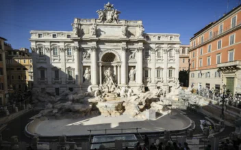 Tourists Toss Coins Over Makeshift Pool as Rome’s Trevi Fountain Undergoes Maintenance