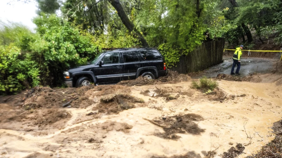 Storm Inundates Northern California With Rain, Heavy Snow; Thousands Remain in the Dark in Seattle