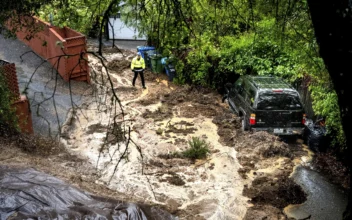 Storm Inundates Northern California With Rain, Heavy Snow; Thousands Remain in the Dark in Seattle