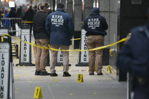 Police Continue Manhunt for Suspect in Fatal Shooting of ...