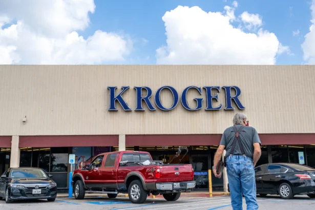 A customer walks into a Kroger grocery store in Houston on Sept. 9, 2022. (Brandon Bell/Getty Images)