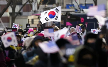 South Koreans Protest After Court Approves Arrest Warrant for President Yoon