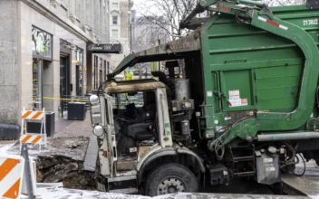 Downtown Omaha Loses Power for Hours After Garbage Truck Gets Stuck in Sinkhole