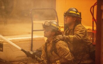 Firefighters Battle Devastating Los Angeles Wildfires as Winds Calm Somewhat